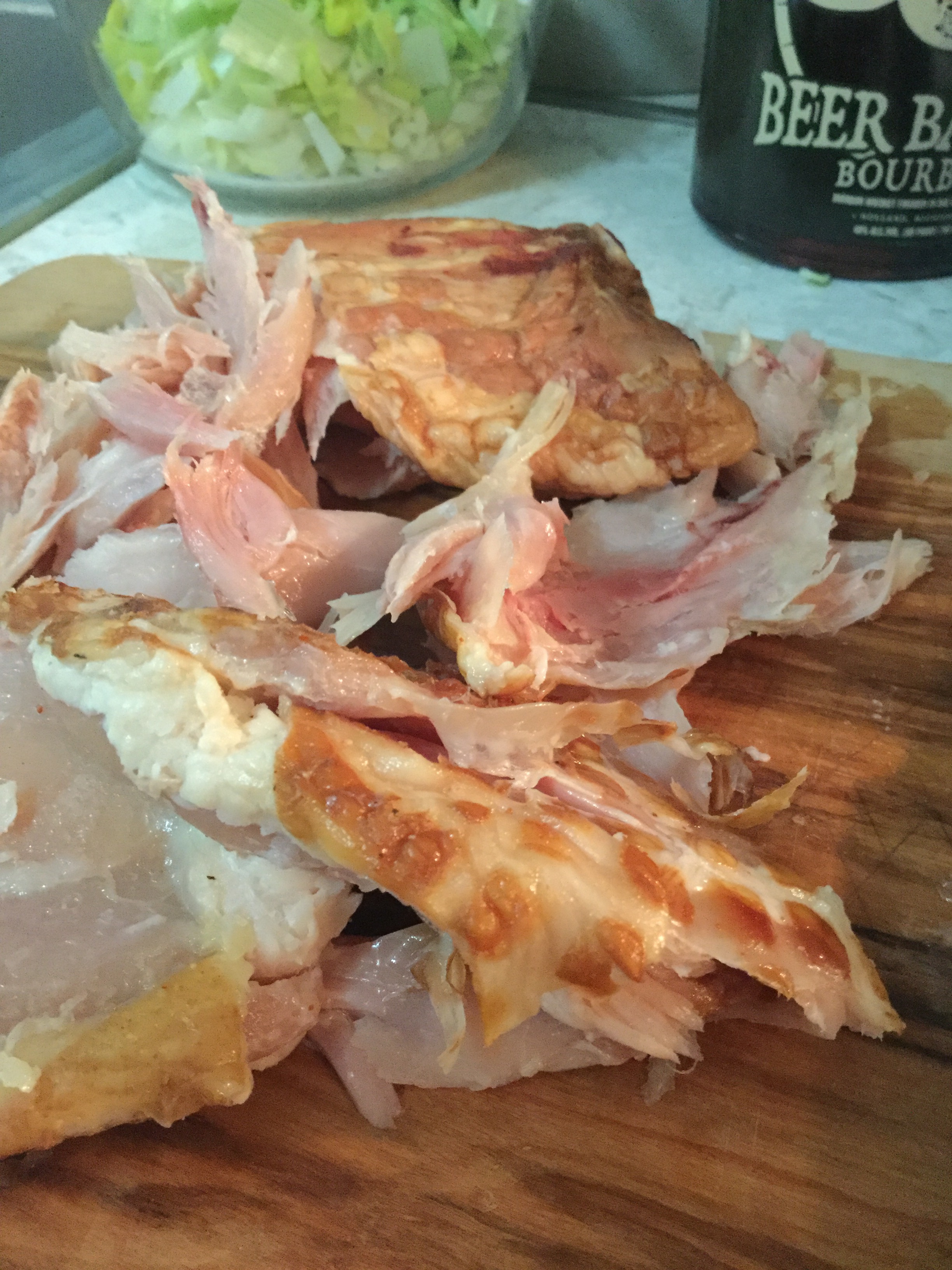 smoked chicken, recently removed from the bones, ready to be shredded and chopped